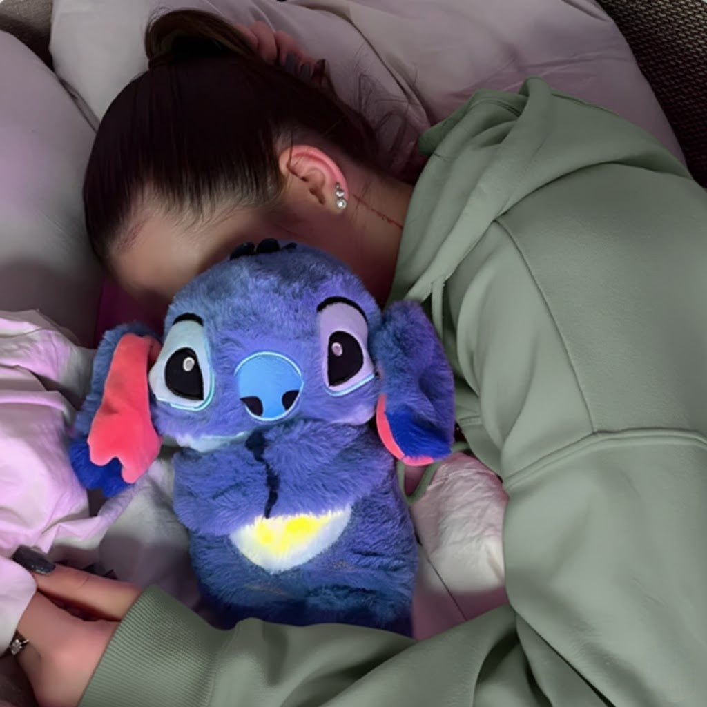 Person lying down with a plush toy resembling a character from a popular animated movie.
