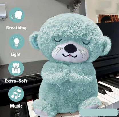 Light blue teddy bear plush toy with features listed on a pian