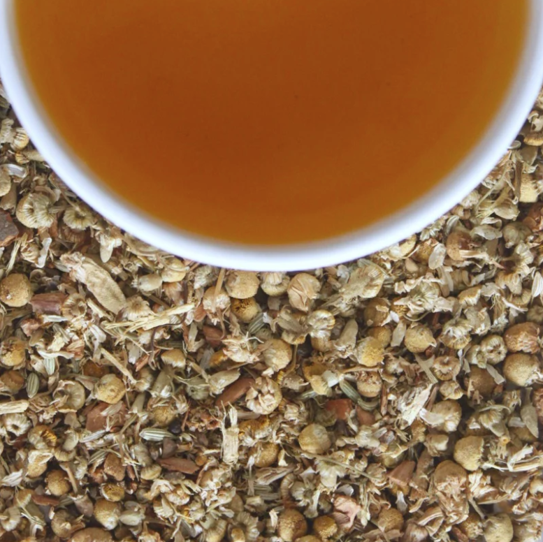LittleCalm Amber Olympus chamomile valerian sleep tea cup on loose leaf blend – premium caffeine-free herbal tea for deep calm and stress relief, warm honey-amber brew with fennel and liquorice, loose leaf no microplastics India