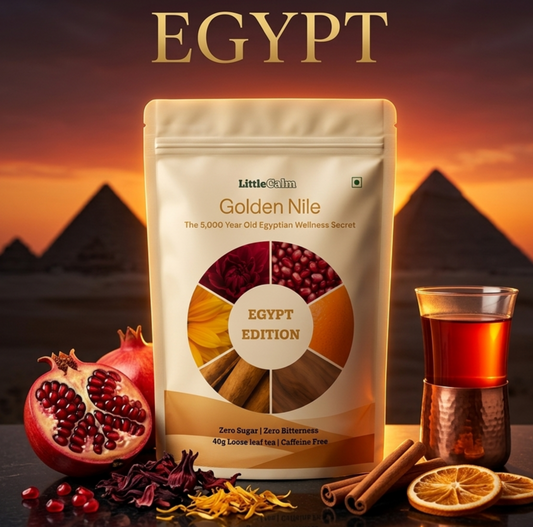 LittleCalm Golden Nile — Ancient Egyptian hibiscus pomegranate loose leaf herbal tea, 40g caffeine-free zero sugar Egypt Edition, with Pyramids of Giza backdrop and real hibiscus, marigold, cinnamon, and orange ingredients