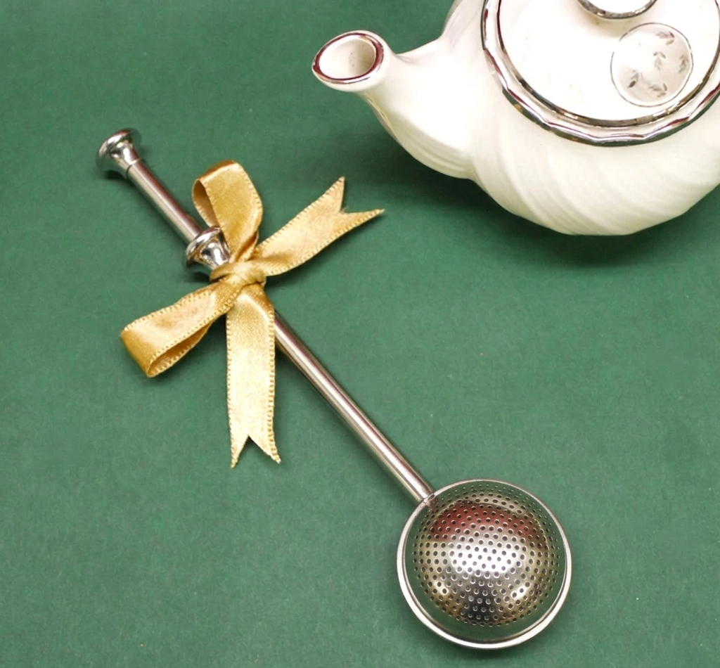 LittleCalm stainless steel sphere tea infuser with decorative gold ribbon bow